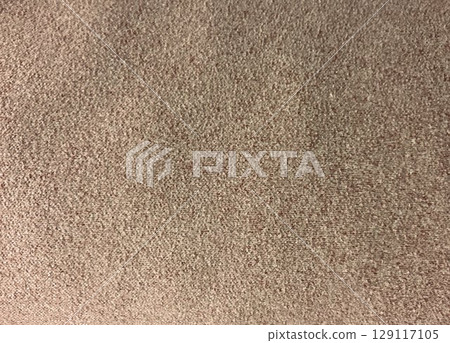 Old orange background texture that resembles sandy paper with a rough texture 129117105