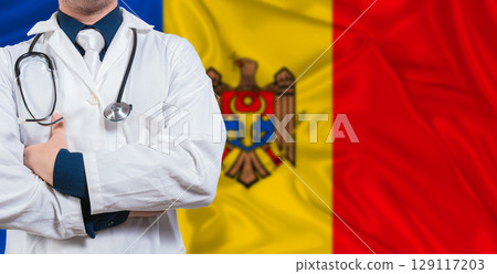 Male doctor with stethoscope on Moldova flag. Doctor holding stethoscope on Moldova flag Male doctor with stethoscope on Moldova flag. Doctor holding stethoscope on Moldova flag 129117203
