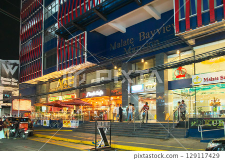 The dynamic Philippines - Evening view of bustling Manila (Malate) Cityscape (May 2025) 129117429