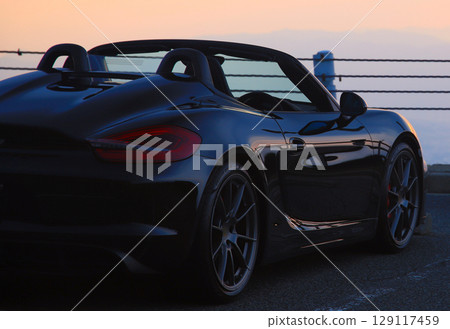 Glossy black open car Glossy black open car 129117459