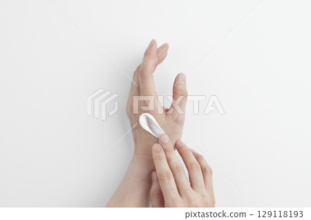 Skincare Beauty. Cosmetic cream texture for gentle moisturizing of healthy hands. Skincare Beauty. Cosmetic cream texture for gentle moisturizing of healthy hands. 129118193