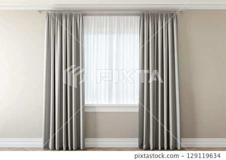 Bright modern interior with large window framed by elegant gray curtains. Natural light flows into the minimalist room with beige walls and wooden flooring, ideal for home decor or curtain showcase Bright modern interior with large window framed by elegant gray curtains. Natural light flows into the minimalist room with beige walls and wooden flooring, ideal for home decor or curtain showcase 129119634