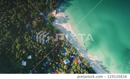 Breathtaking aerial view of Bottle Beach on Koh Phangan island, Thailand, showcasing beautiful resort amidst lush tropical forest, bordering crystal-clear turquoise waters. Travel, tourism, holiday 129120816