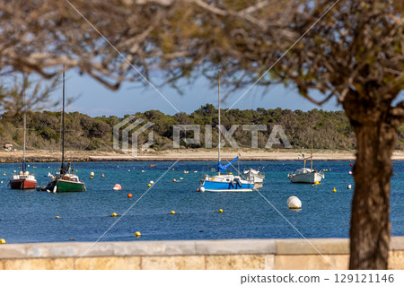 Sailing boats in the harbor bay of Colonia de Sant Jordi, Majorca, Mallorca, Balearic Islands, Spain, Europe Sailing boats in the harbor bay of Colonia de Sant Jordi, Majorca, Mallorca, Balearic Islands, Spain, Europe 129121146
