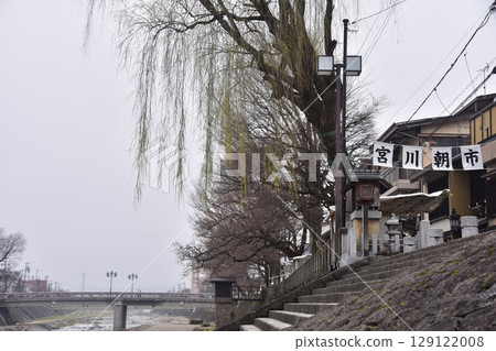 Takayama City, Gifu Prefecture, Japan: Miyagawa River flows through the center of the city, and the tourist attraction Miyagawa Morning Market features street stalls selling local specialties and a shopping street 129122008