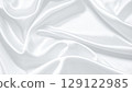 White satin fabric texture with an elegant sheen 129122985