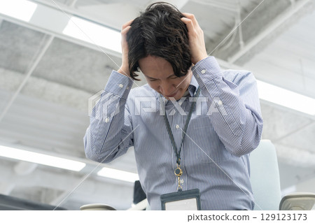 Young male engineer working in the office Young male engineer working in the office 129123173