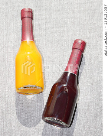 Glass bottled beverages Glass bottled beverages 129123587