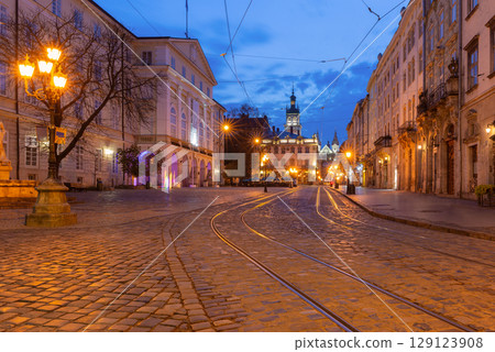 Rynok Square with historic buildings at night Lviv Ukraine 129123908