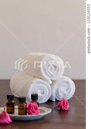 White towels and aroma oil White towels and aroma oil 129124353