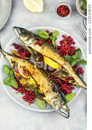 Aromatic fish baked in a berry marinade. Aromatic fish baked in a berry marinade. 129124625