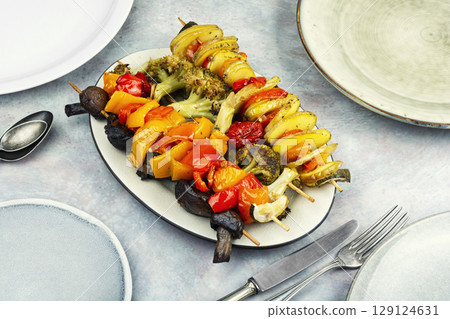 Roasted vegetables on skewers. 129124631