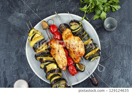 Chicken breast on skewers. Chicken breast on skewers. 129124635