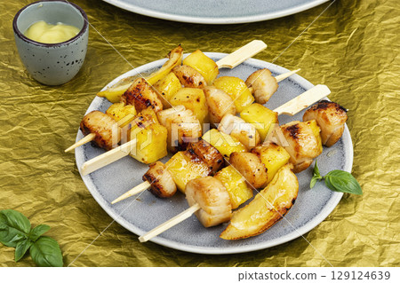 Grilled scallops with pineapple. Grilled scallops with pineapple. 129124639
