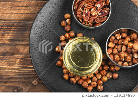 Healthy vegetable nuts oil bottle. 129124650