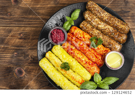 Delicious, uncooked sausages. Delicious, uncooked sausages. 129124652