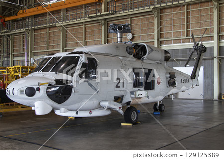 Patrol helicopter undergoing maintenance Patrol helicopter undergoing maintenance 129125389