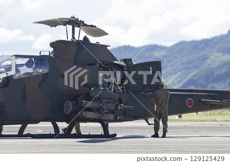 Anti-tank helicopter with engine cowling open 129125429