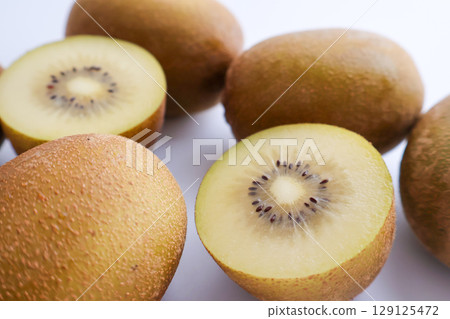 Close-up of cut gold kiwi fruit Close-up of cut gold kiwi fruit 129125472