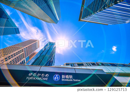 Tokyo cityscape in Japan: Extreme heat...Shiodome business district, Yurikamome Shinbashi Station, trains, sunlight...rays of hope = 20th Tokyo cityscape in Japan: Extreme heat...Shiodome business district, Yurikamome Shinbashi Station, trains, sunlight...rays of hope = 20th 129125713