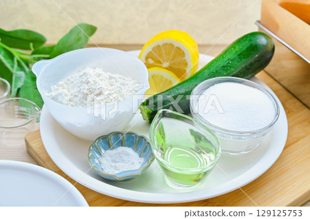Ingredients for making zucchini and lemon pound cake Ingredients for making zucchini and lemon pound cake 129125753