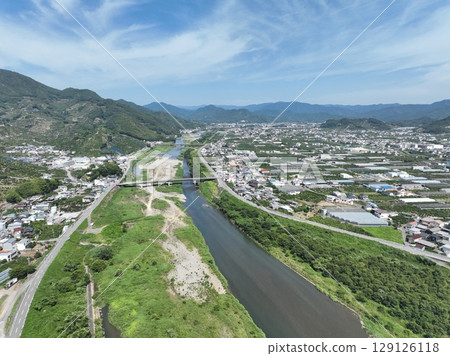 Drone aerial shot of the beautiful mandarin orange hills of Wakayama Prefecture 129126118