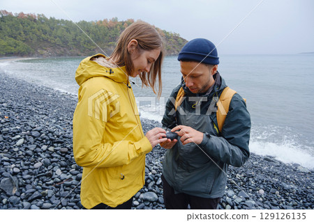 Couple enjoys Turkish coastline near Kemer. 129126135