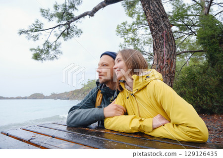 Couple enjoys Turkish coastline near Kemer. 129126435