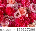 Assortment of red and pink flowers 129127299