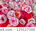 Assortment of red and pink flowers 129127300