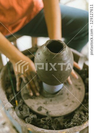 The process of creating pottery.  129127611