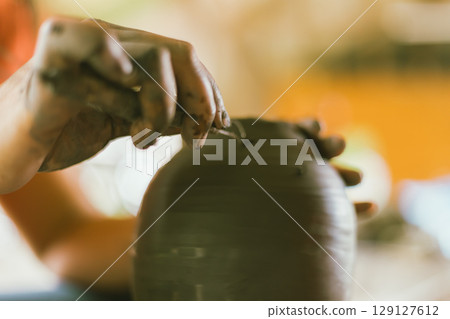 The process of creating pottery.  129127612