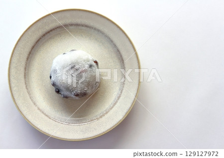 Bean Daifuku seen from directly above on a white background Bean Daifuku seen from directly above on a white background 129127972