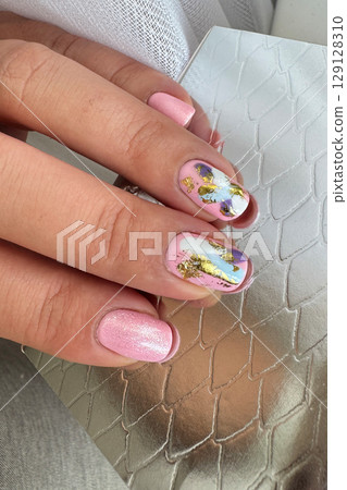 Elegant Hand with Modern Abstract Nail Art Elegant Hand with Modern Abstract Nail Art 129128310