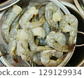 Fresh Raw Shrimp in Colander Ready for Preparation and Cooking for Delicious Seafood Dishes Fresh Raw Shrimp in Colander Ready for Preparation and Cooking for Delicious Seafood Dishes 129129934