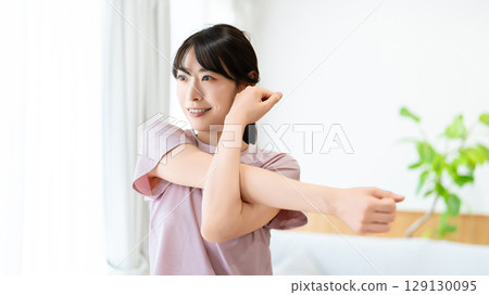 Women stretching Women stretching 129130095