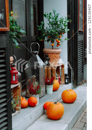 Autumn outdoor decor with pumpkins, citrus trees, and lanterns in Prague, october 129130407