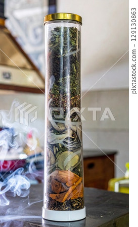 Smoked Cylinder Full Of Lentils And Onions Inside Modern Kitchen With Tile Backsplash 129130863