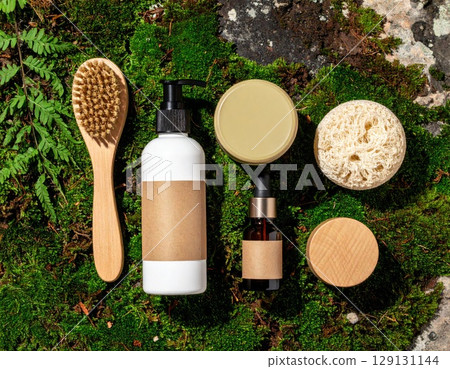 Assortment of Natural Skincare Products on Green Moss and Stone Background Assortment of Natural Skincare Products on Green Moss and Stone Background 129131144