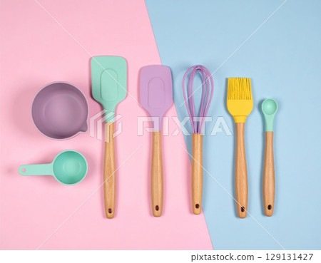 Pastel Kitchen Utensils Arrangement on Pink and Blue Split Background Still Life Pastel Kitchen Utensils Arrangement on Pink and Blue Split Background Still Life 129131427