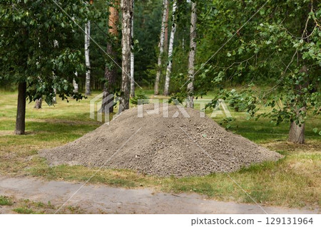 A Natural Pile of Gravel Beautifully Placed in a Peaceful Park Setting Surrounded by Nature A Natural Pile of Gravel Beautifully Placed in a Peaceful Park Setting Surrounded by Nature 129131964