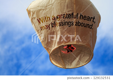 Sky Lantern with Blessing Message Soaring in Pingxi New Taipei City Taiwan. Sky Lantern with Blessing Message Soaring in Pingxi New Taipei City Taiwan. 129132531