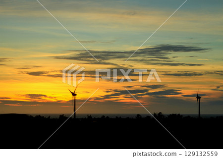 Golden Sunset with Wind Turbines at Longgang Miaoli Taiwan. Golden Sunset with Wind Turbines at Longgang Miaoli Taiwan. 129132559