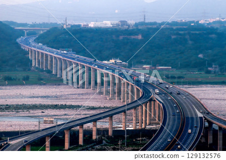 Zhongqing Interchange and Dadu River in Taichung, Taiwan at dusk. Zhongqing Interchange and Dadu River in Taichung, Taiwan at dusk. 129132576