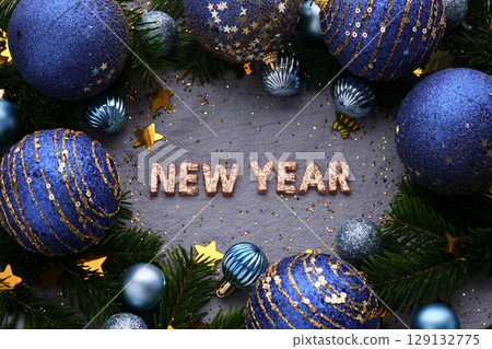 Abstract New Year blue background with Christmas decorations. Abstract New Year blue background with Christmas decorations. 129132775