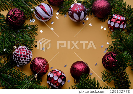Christmas new year yellow background. Place for the text in Christmas decoration. 129132778