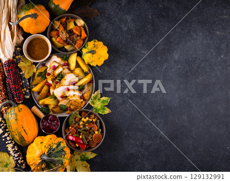 Traditional Thanksgiving day dinner with turkey Traditional Thanksgiving day dinner with turkey 129132991