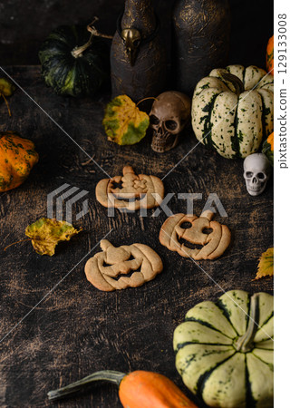 Halloween cookies in shape of jack-o-lantern Halloween cookies in shape of jack-o-lantern 129133008