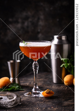 Fresh apricot cocktail martini with mint Fresh apricot cocktail martini with mint 129133012
