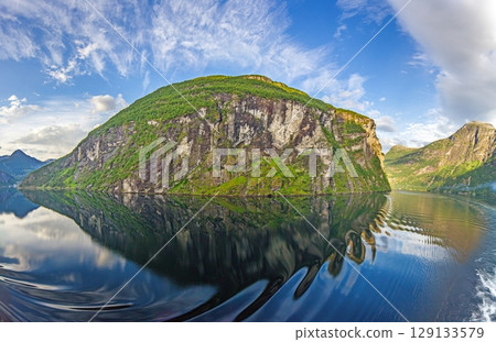 geirangerfjord reflective fjord mountain panorama geirangerfjord reflective fjord mountain panorama 129133579